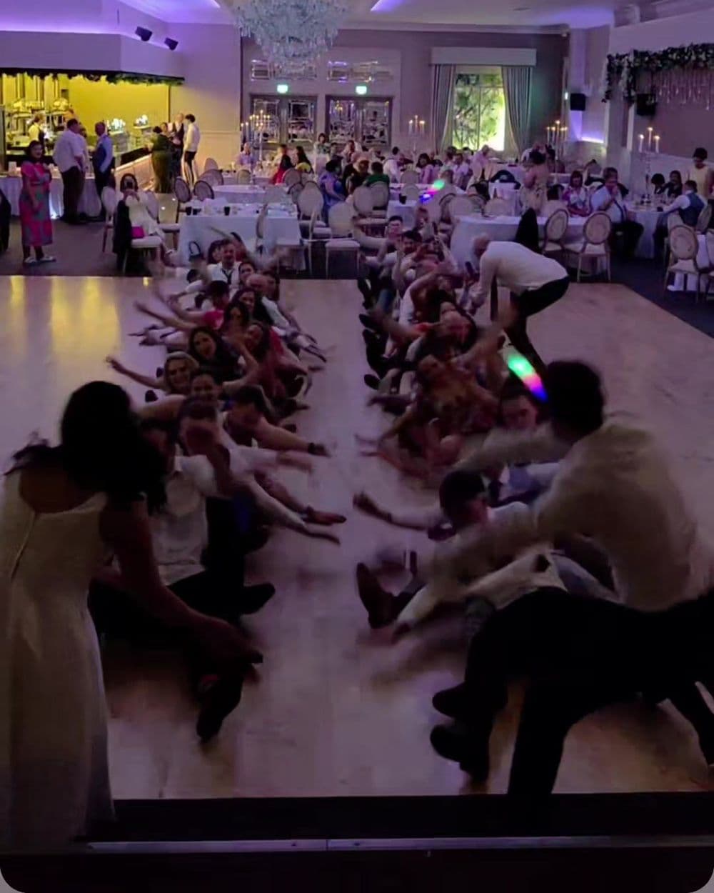The bride and guests rocking the boat on a Cork wedding dancefloor