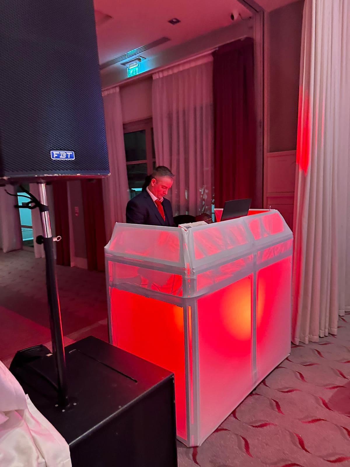 DJ booth and sound system at a corporate event