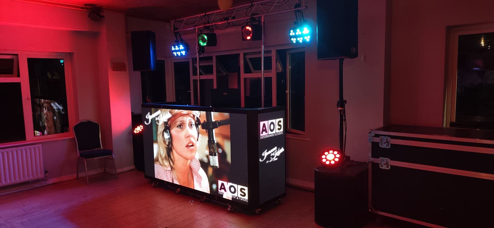 AOS LED video DJ booth set up for a wedding